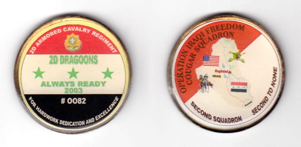 Round shaped coin, antique brass in color, 1 37/64 inches in diameter.