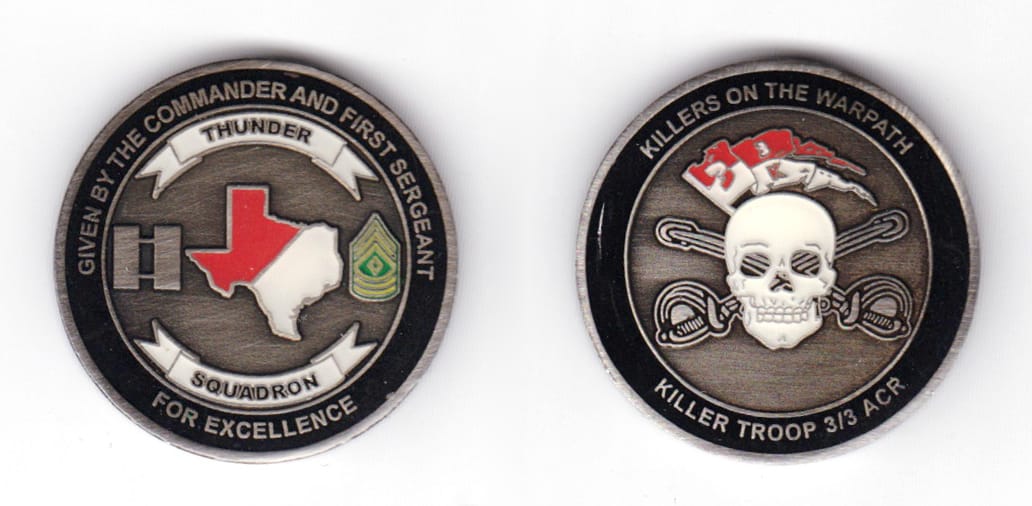 Round shaped coin, gunmetal black in color, 1 1/2 inches in diameter.