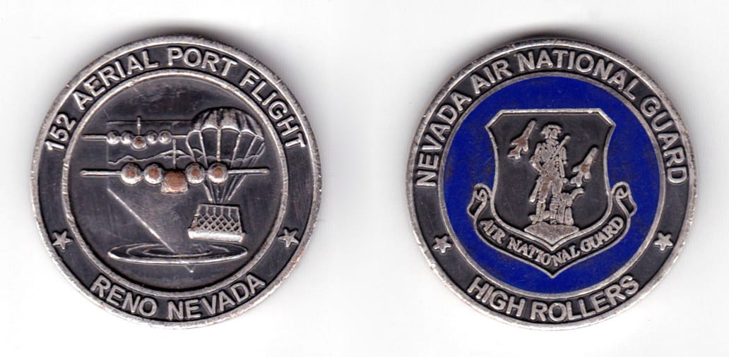 Round shaped coin, antique brass in color, 1 15/32 inches in diameter.