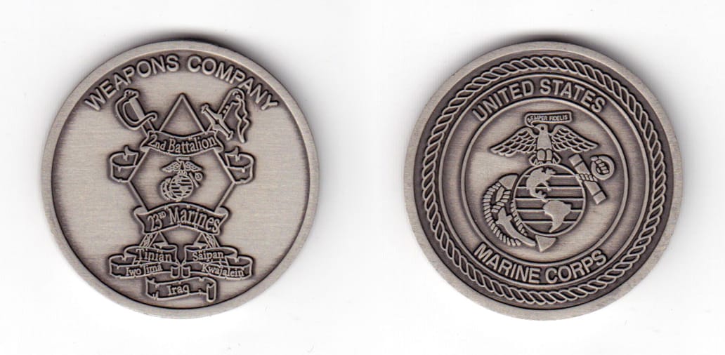 Round shaped coin, antique pewter in color, 1 1/2 inches in diameter.