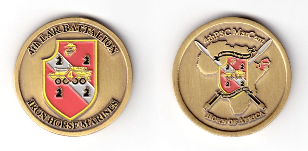 Round shaped coin, brass in color, 1 1/2 inches in diameter.