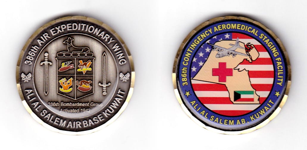 Round shaped coin, pewter in color with gold Bezzle, 1 3/4 inches in diameter.