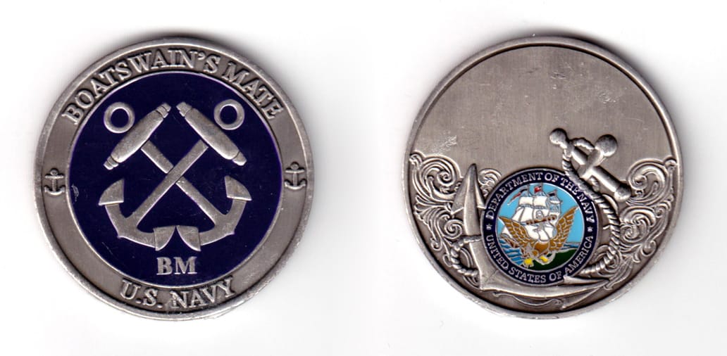 Round shaped coin pewter in color, 1 3/4 inches in diameter.