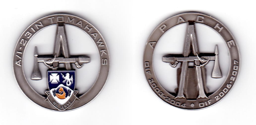 Round shaped coin, pewter in color, 1 3/4 inches in diameter.