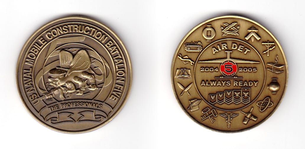 Round shaped coin, brass in color, 1 49/64 inches in diameter.