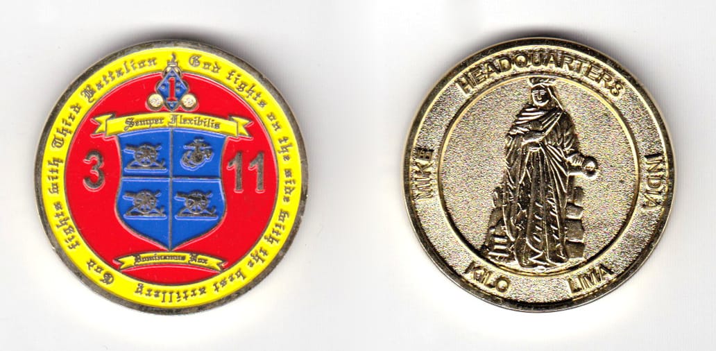 Round shaped coin, gold in color, 1 1/2 inches in diameter.