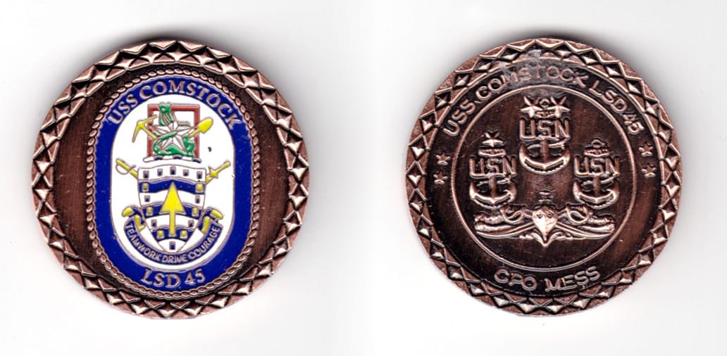 Round shaped coin, copper in color, 1 33/64 inches in diameter.