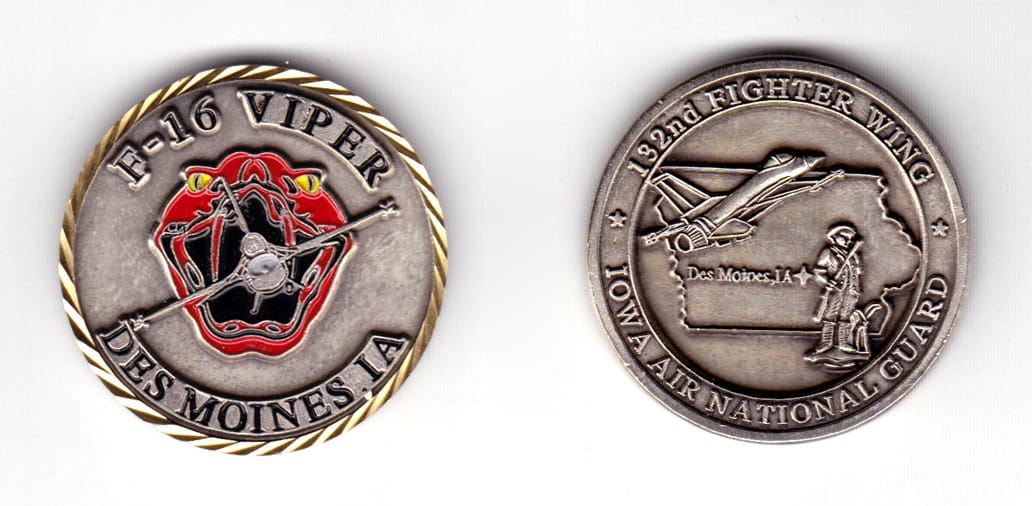 Round shaped coin, pewter in color, 1 19/32 inches in diameter.