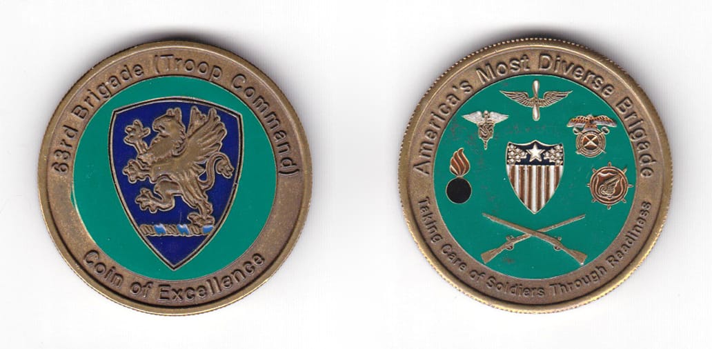 Round shaped coin, antique brass in color, 1 17/32 inches in diameter.