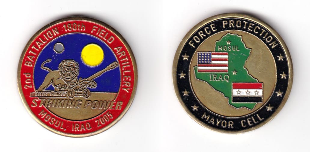 Round shaped coin, brass in color, 1 43/64 inches in diameter.