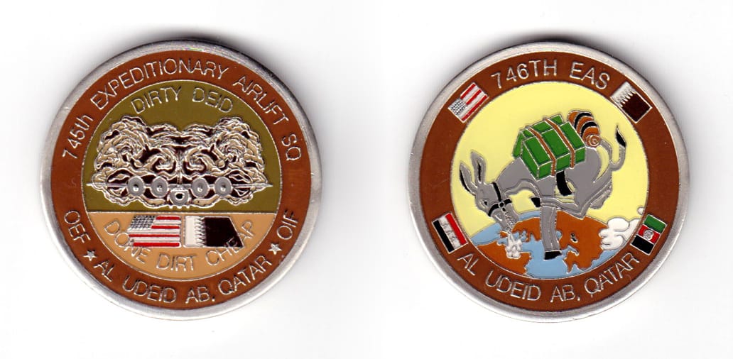 Round shaped coin, pewter in color, 1 43/64 inches in diameter.