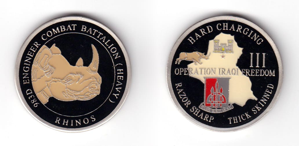 Round shaped coin, pewter in color, 1 43/64 inches in diameter.