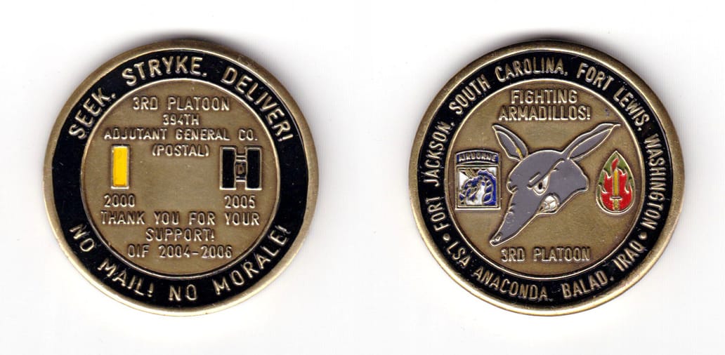 Round shaped coin, brass in color, 1 3/64 inches in diameter.