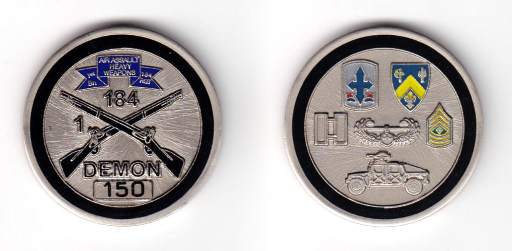 Round shaped coin, pewter in color, 1 11/16 inches in diameter.