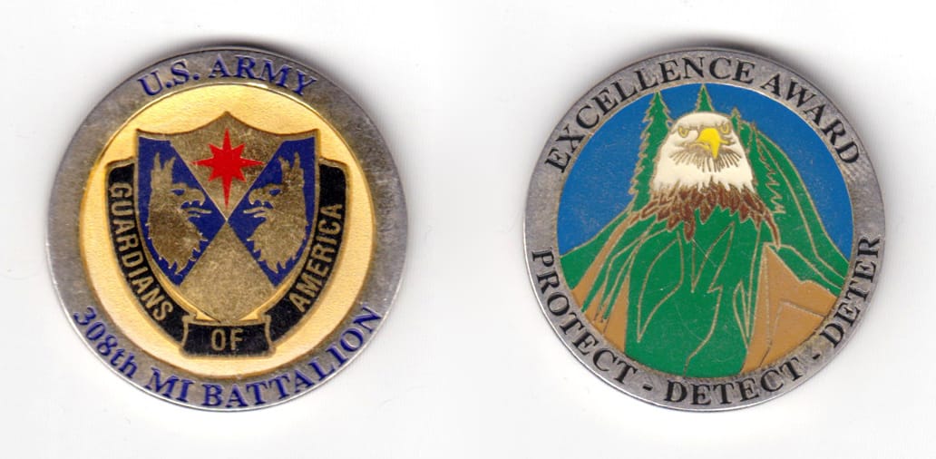 Round shaped coin, pewter in color, 1 33/64 inches in diameter.