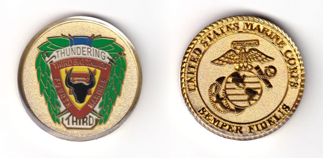 Round shaped coin, brass in color, 1 1/2 inches in diameter.