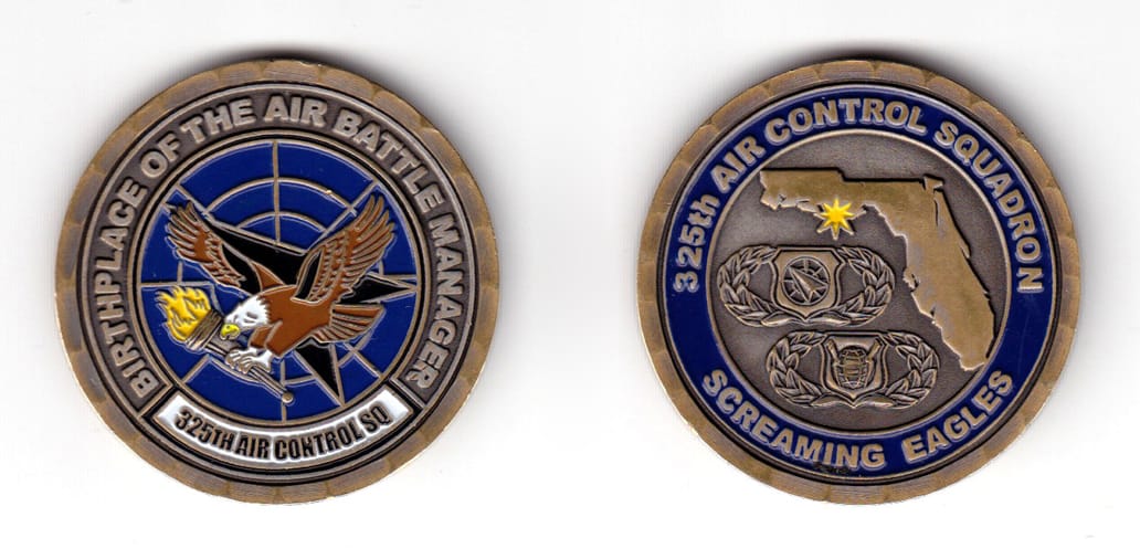 Round shaped coin, antique brass in color, 1 3/4 inches in diameter.