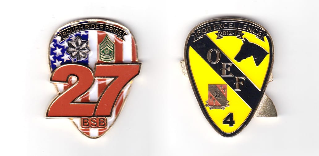 Shield shaped coin with the digits "27" in front and extending beyond the shield, brass in color, 2 29/64 inches high x ...