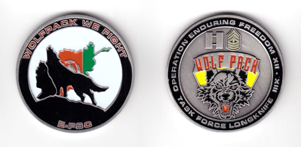 Round shaped coin, pewter in color, 2 1/32 inches in diameter.