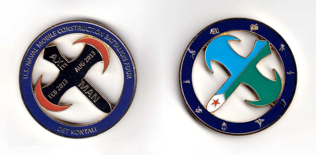 Round shaped coin, brass in color, 2 1/64 inches in diameter.