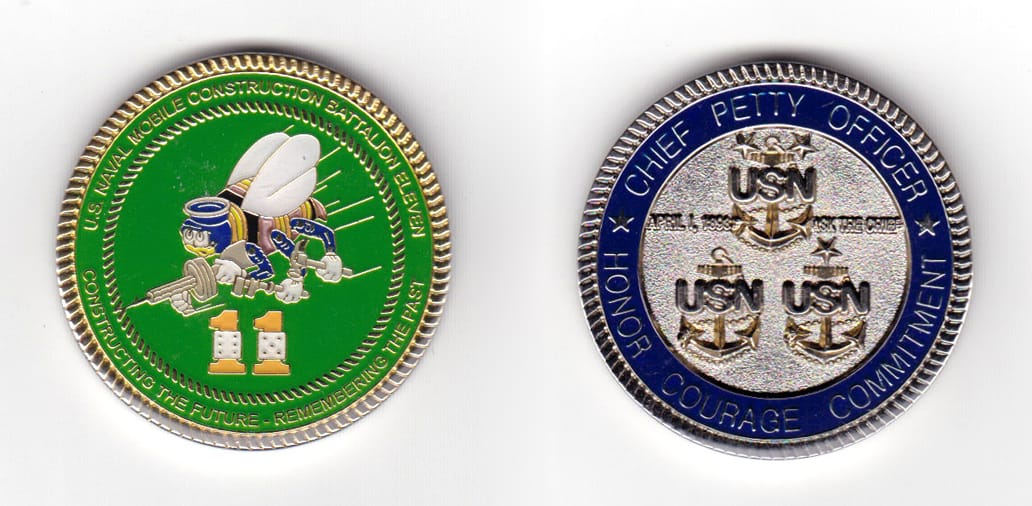 Round shaped coin, pewter in color, 1 9/16 inches in diameter.