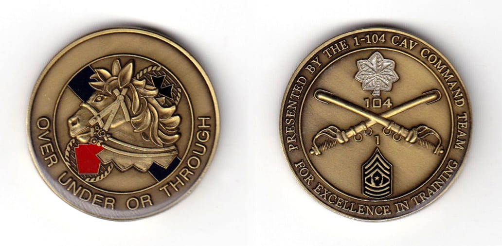 Round shaped coin, brass in color, 1 31/64 inches in diameter.