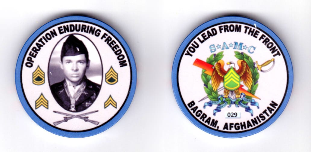 Round shaped poker chip, blue and white in color, 1 57/64 inches in diameter.