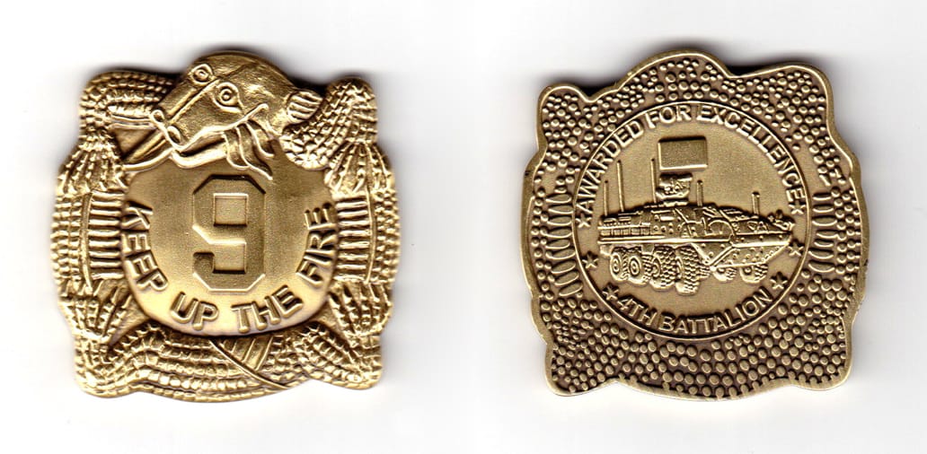 4-sided coin made up of a snake surrounding a round shape, antique brass in color, 1 31/32 inches high x 1 31/32 inches ...