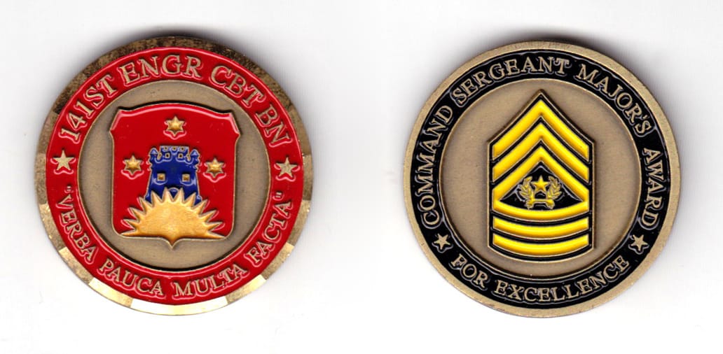 Round shaped coin, antique brass in color, 1 19/32 inches in diameter.