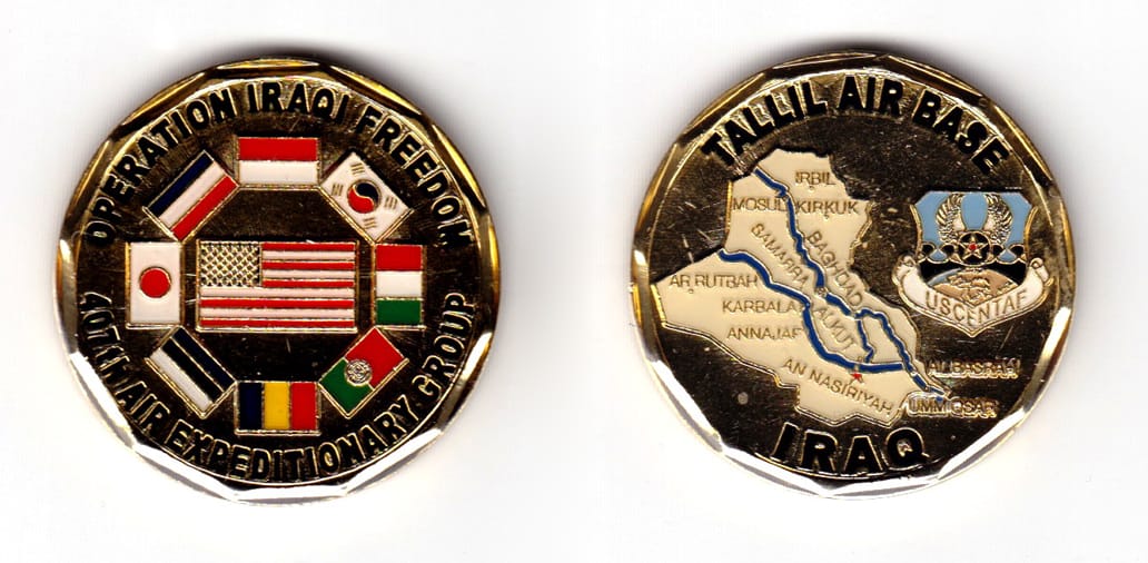 Round shaped coin, brass in color, 1 43/64 inches in diameter.