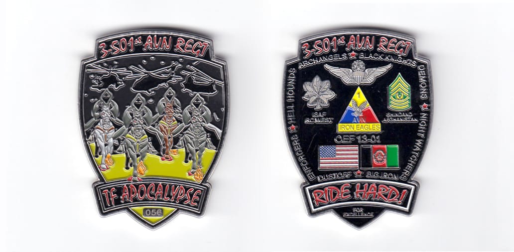 Shield shaped coin with banner over and banner across the bottom and extending beyond the shield, pewter in color, 2 27/...