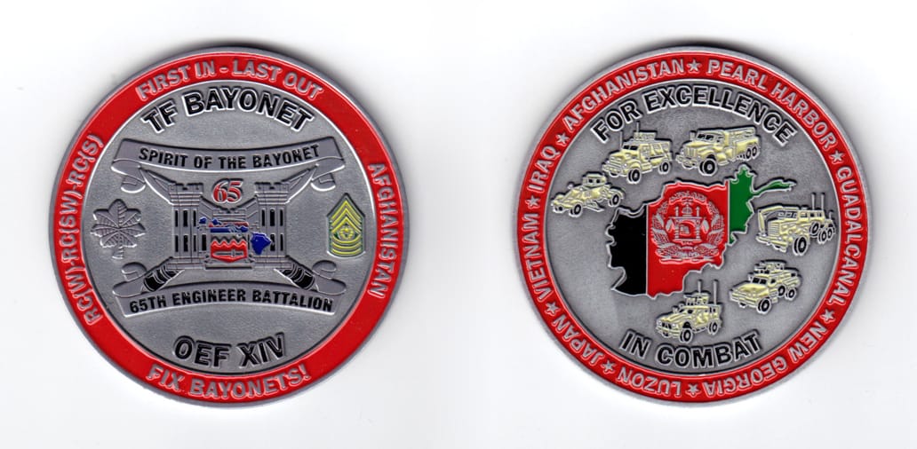 Round shaped coin, pewter in color, 2 31/64 inches in diameter.