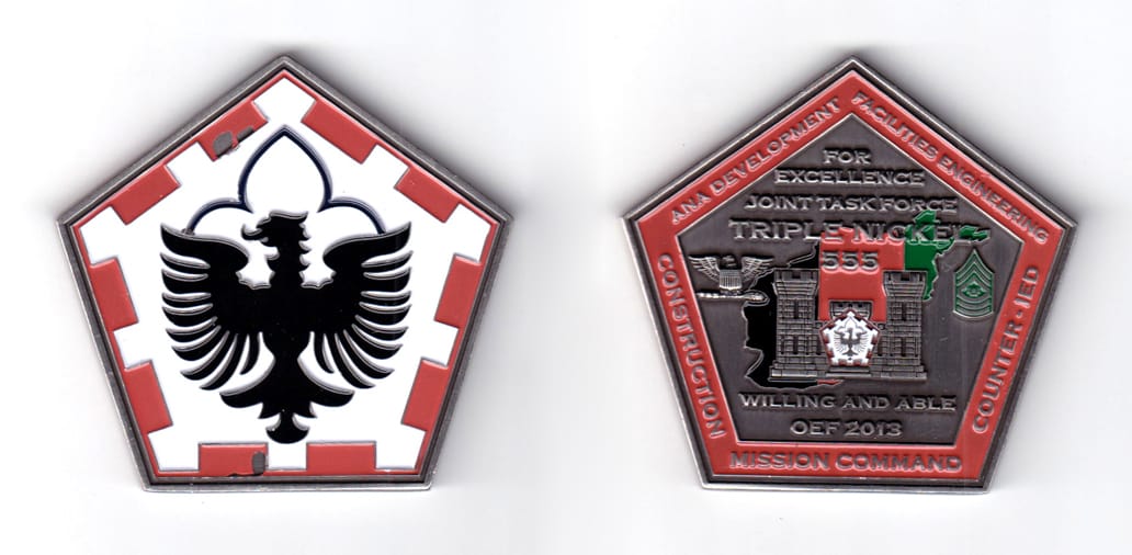 Pentagon shaped coin, pewter in color, 2 1/2 inches high x 2 5/8 inches wide.