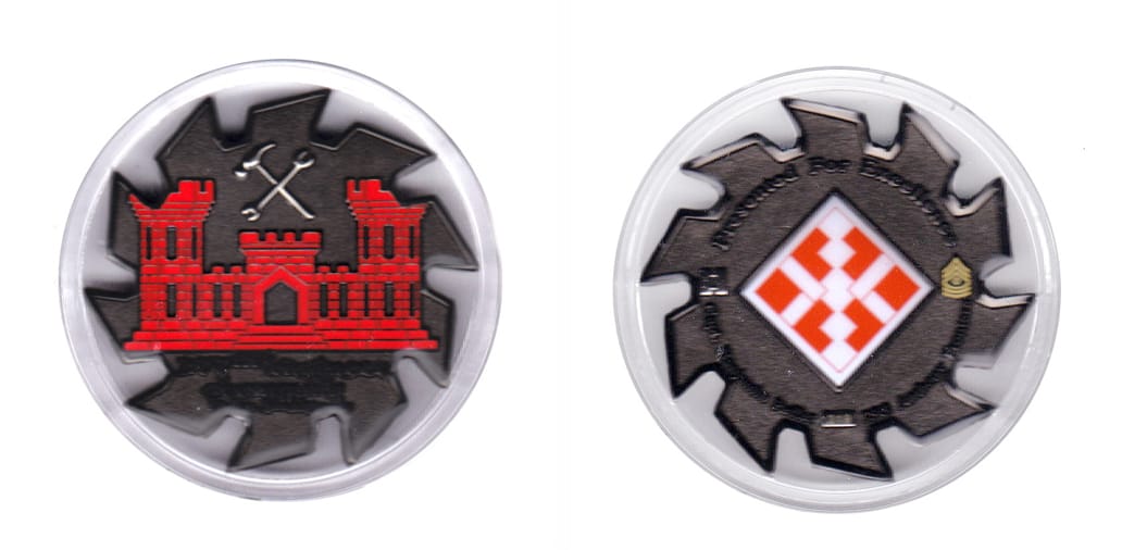 Circular saw blade shaped coin, antique brass in color, 2 15/64 inches in diameter.