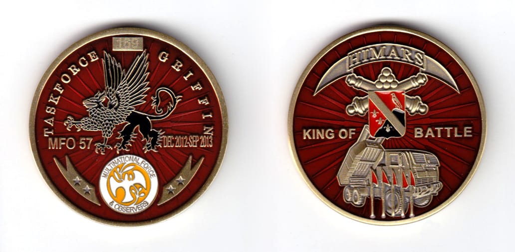 Round shaped coin, brass in color, 1 3/4 inches in diameter.