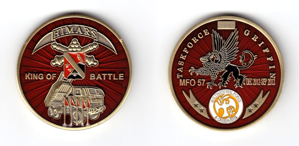 Round shaped coin, brass in color, 1 3/4 inches in diameter.