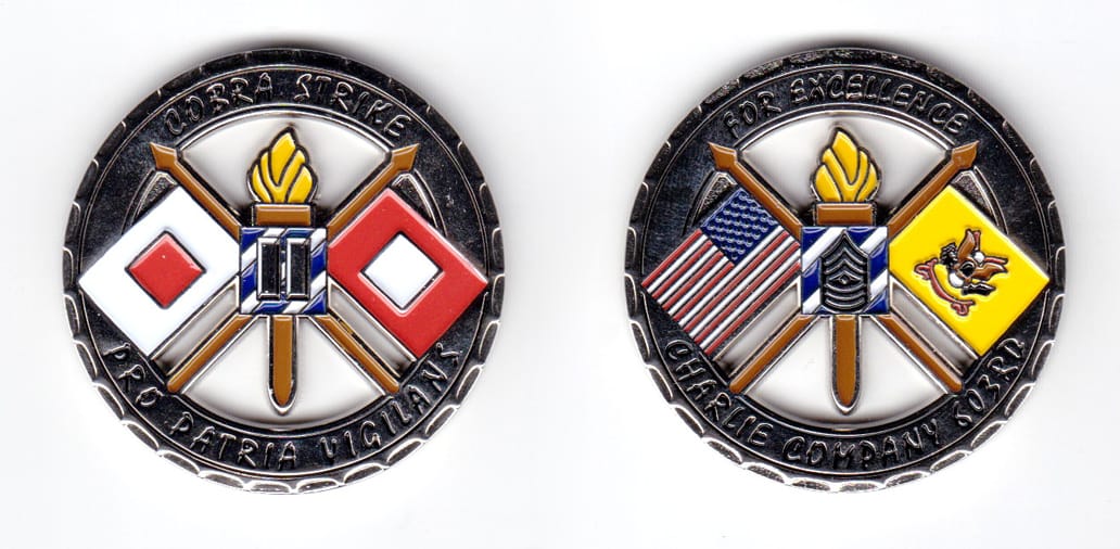 Round shaped coin, silver in color, 1 3/4 inches in diameter.