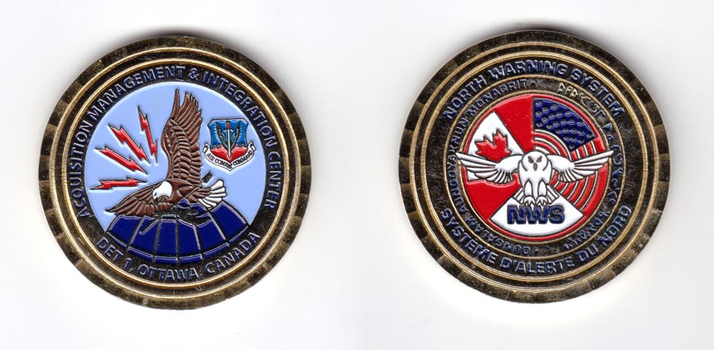 Round shaped coin brass in color, 1 3/4 inches in diameter.