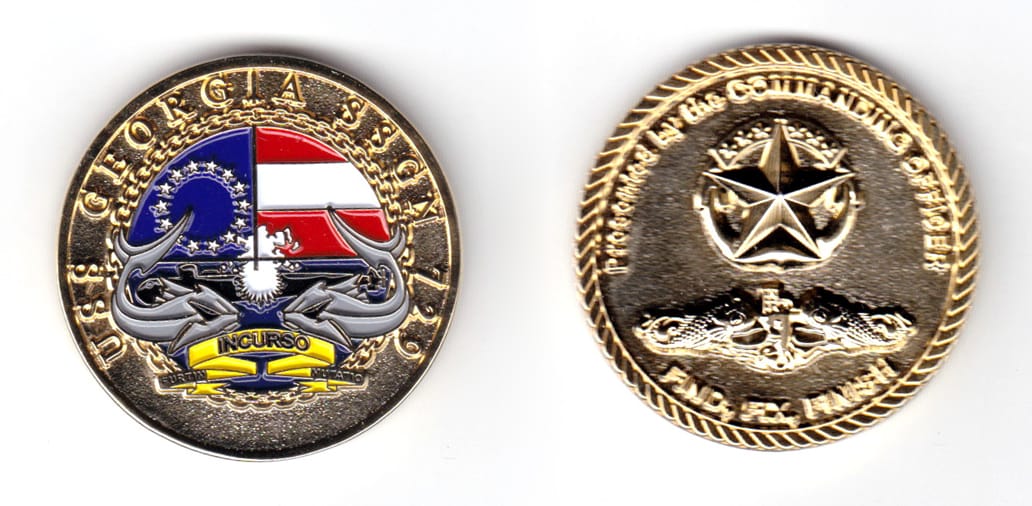 Round shaped coin, brass in color, 1 49/64 inches in diameter.