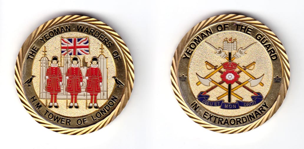 Round shaped coin, brass in color, 1 49/64 inches in diameter.