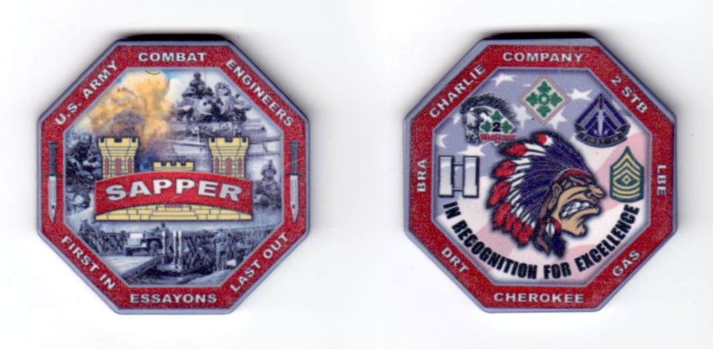 Octogon shaped poker chip, red and gray in color, 1 45/64 inches high x 1 45/64 inches wide.