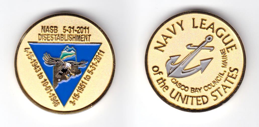 Round shaped coin, brass in color, 1 47/64 inches in diameter.