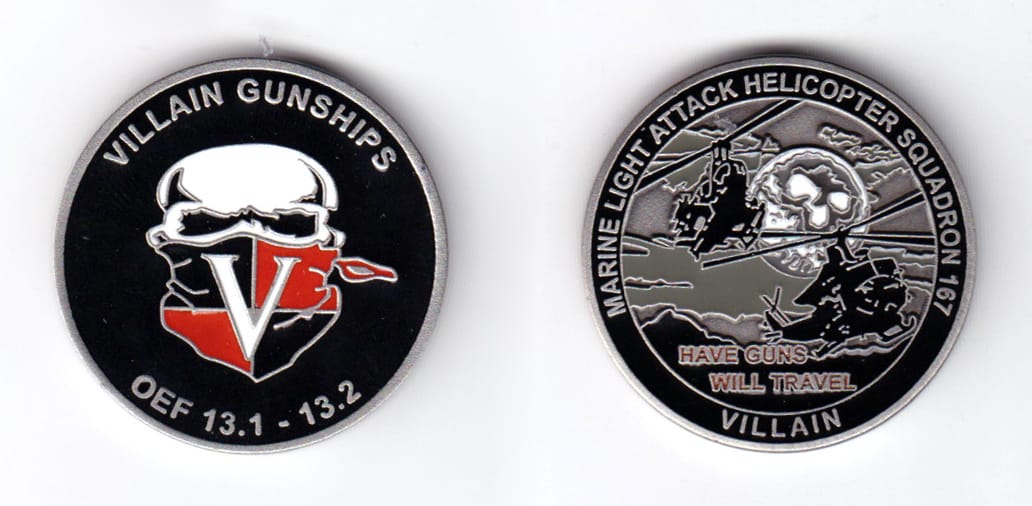 Round shaped coin, pewter in color, 1 1/2 inches in diameter.