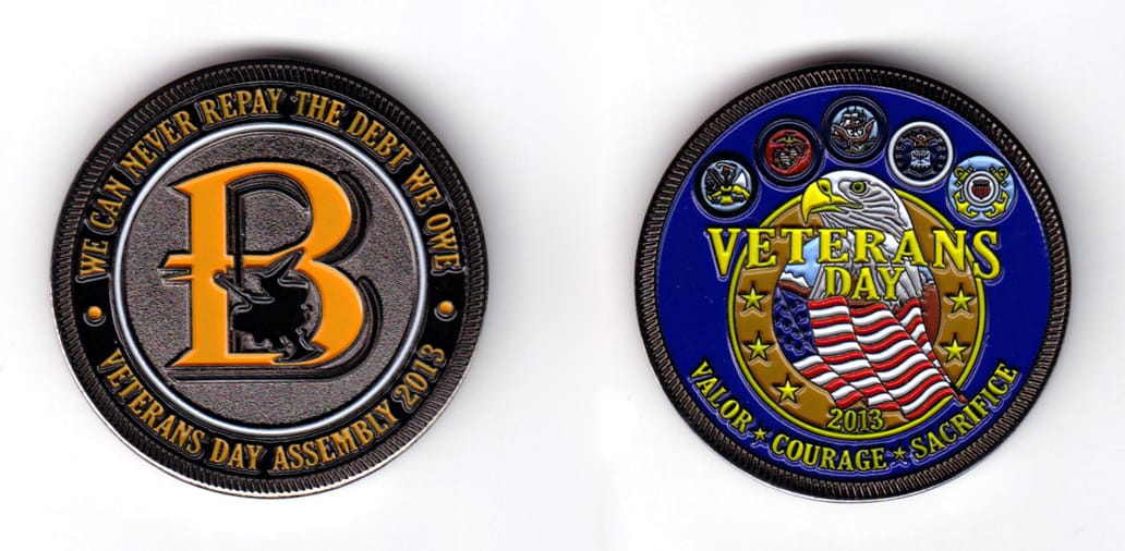 Round shaped coin, pewter in color, 1 3/4 inches in diameter..