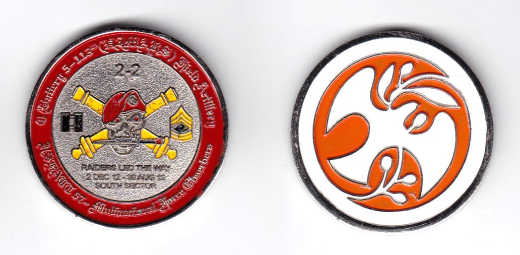 Round shaped coin, brass in color, 1 61/64 inches in diameter.