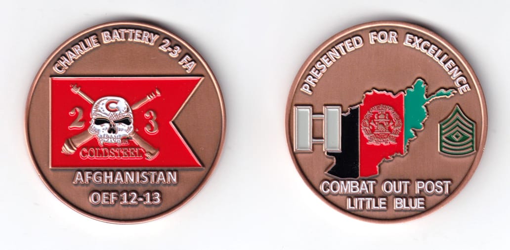 Round shaped coin, copper in color, 2 inches in diameter.