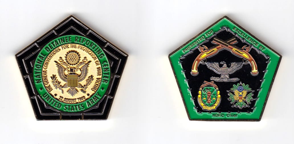 Pentagon shaped coin, brass in color, 1 13/16 inches high x 1 31/32 inches wide.