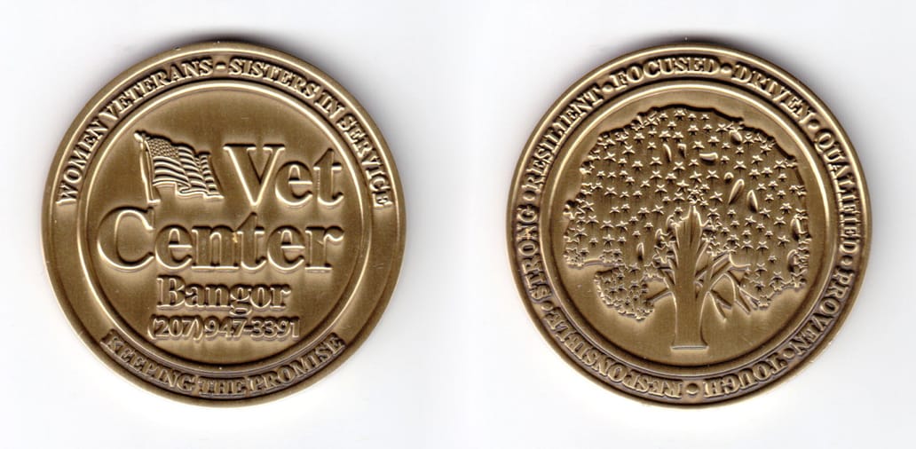 Round shaped coin, antique brass in color, 1 31/32 inches in diameter.