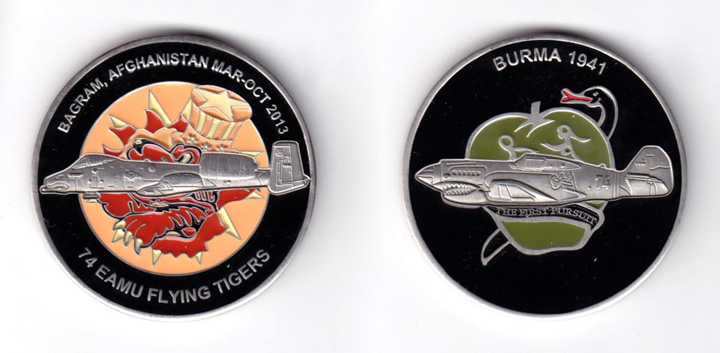 Round shaped coin, pewter in color, 2 inches in diameter.