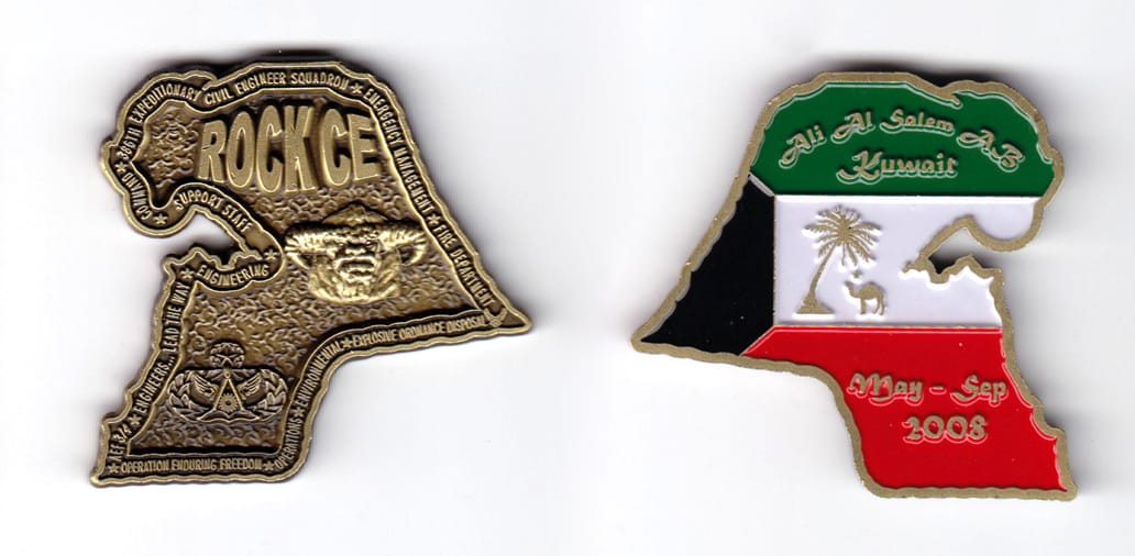 Coin is shaped like an outline of the map of Kuwait, antique brass in color, 1 57/64 high x 1 31/32 inches wide.